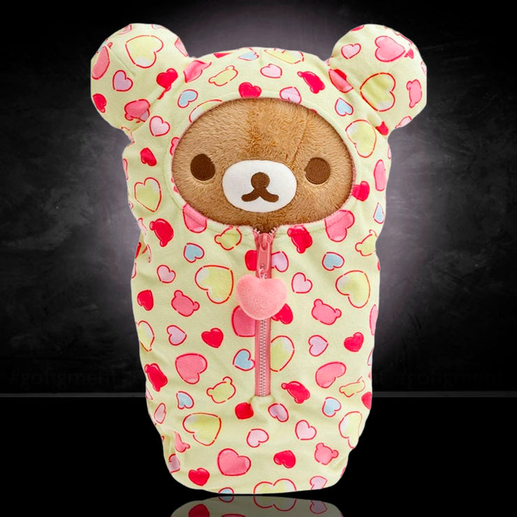 San-X Rilakkuma plush sleeping bag in yellow with pink heart patterns and a front zipper closure