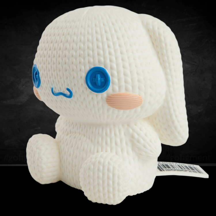 Handmade by Robots Cinnamoroll vinyl figure in knit-inspired texture with blue button eyes and pastel cheeks.