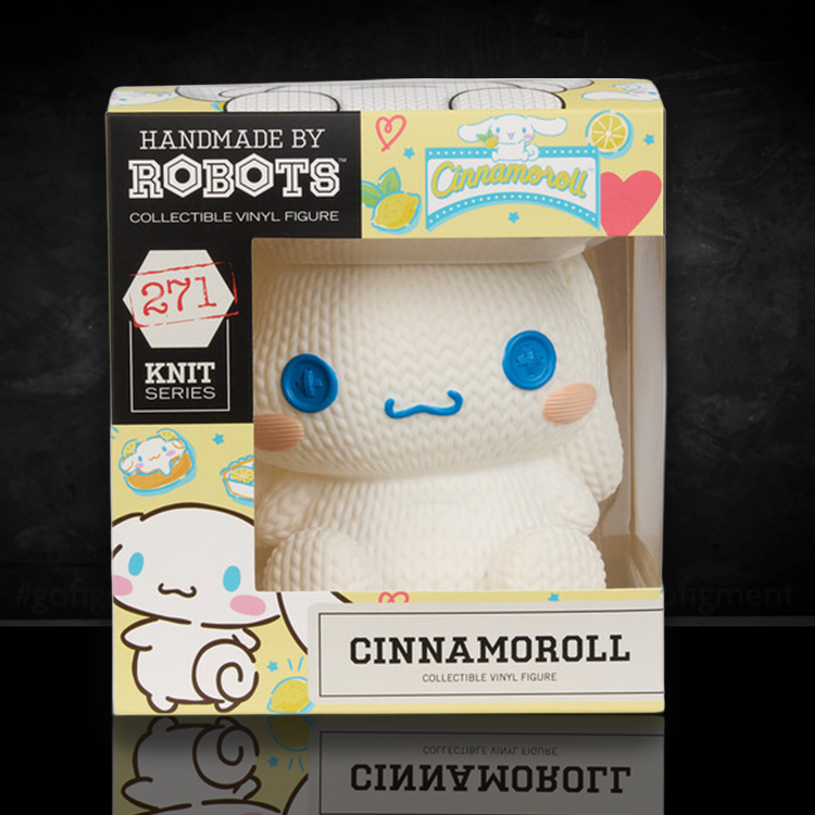 Handmade by Robots Cinnamoroll collectible vinyl figure in knit-inspired design with blue button eyes and blush cheeks.