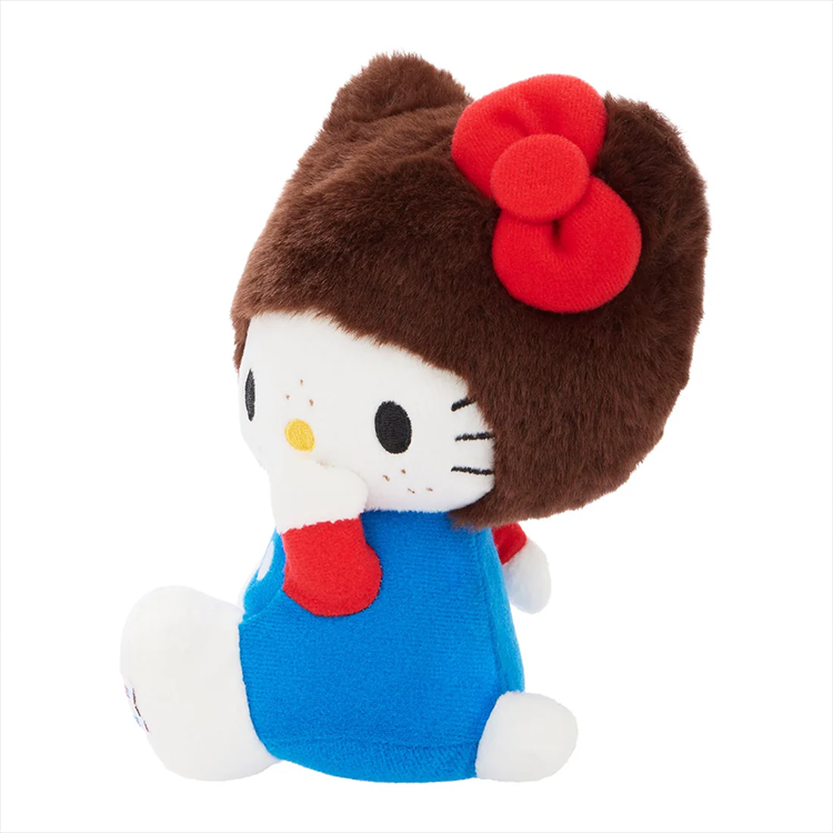 Hello Kitty dressed as Monchhichi wearing a brown fuzzy hood and blue overalls plush by Sekiguchi