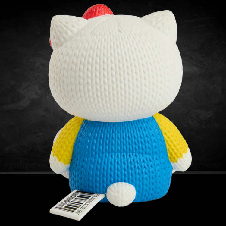 Handmade by Robots Hello Kitty vinyl figure showing knit-like texture and red bow, viewed from the back, on black background