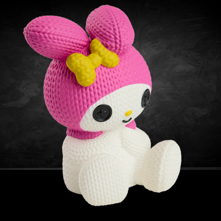 Handmade by Robots My Melody figure with knit-inspired texture and bright pink hood sitting against dark background