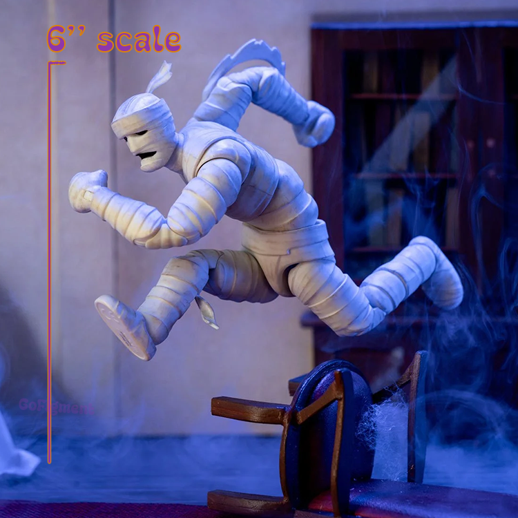 Jada Toys Scooby-Doo Mummy of Ankha 6-inch action figure posed mid-lurch with detailed bandages and spooky setting.