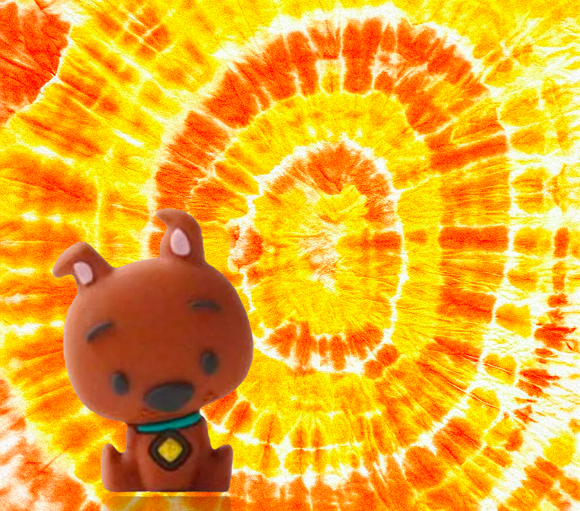 Scooby-Doo UCC 3D mini figure collectible with bright orange and yellow tie-dye background vibrant design