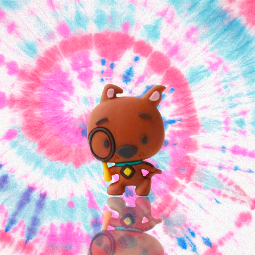 Scooby-Doo 3D mini figure holding magnifying glass on colorful tie-dye background by UCC