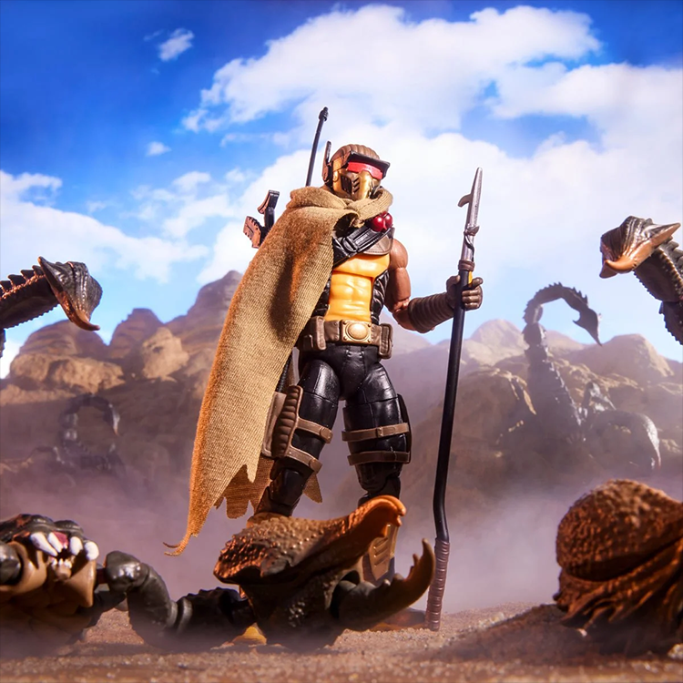 Hasbro G.I. Joe Cobra Desert Scorpion figure with fabric cape and mechanical scorpion in desert setting.