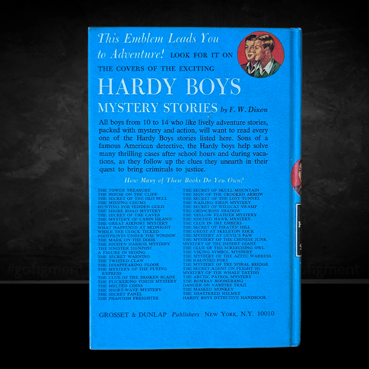 Vintage Hardy Boys blue hardcover back cover listing titles published by Grosset & Dunlap New York edition
