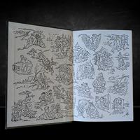Open book showing black and white illustrated endpapers from vintage Hardy Boys novel by Grosset & Dunlap