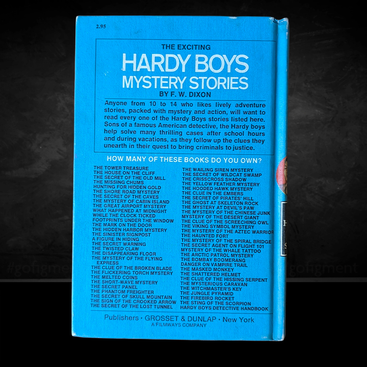 Back cover of vintage Hardy Boys Mystery book by F. W. Dixon, listing titles, published by Grosset & Dunlap.
