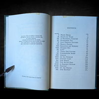 Open vintage Hardy Boys book showing copyright and detailed contents pages from 1952 Grosset & Dunlap edition