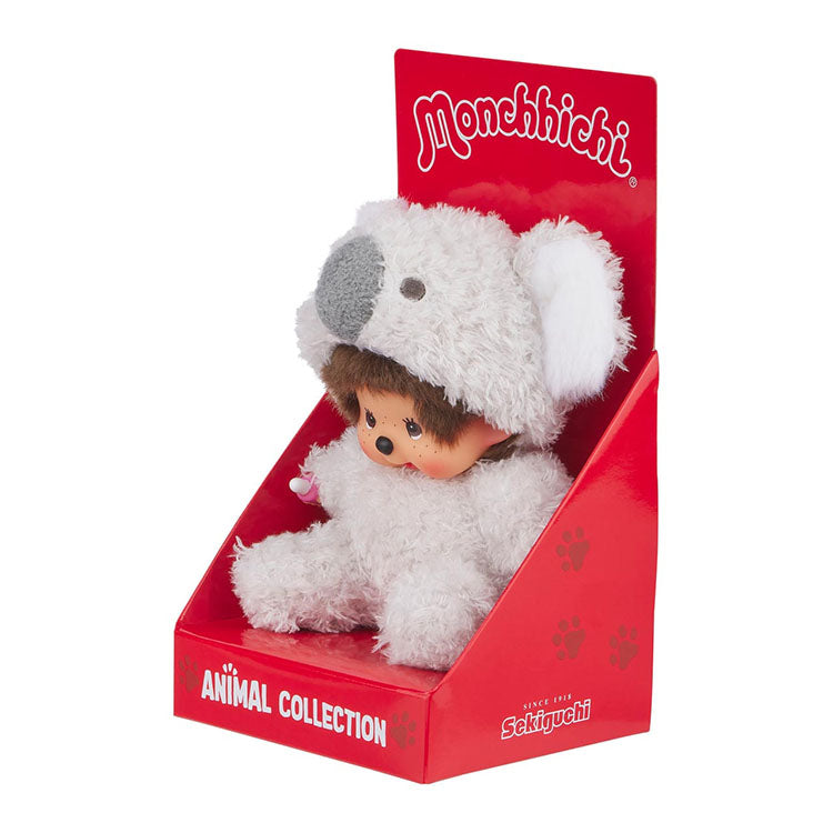 Sekiguchi Monchhichi plush doll dressed as a fluffy koala sitting in red branded packaging.