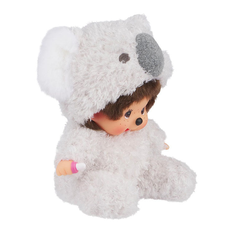 Sekiguchi Monchhichi sitting plush dressed in soft fluffy koala costume with thumb in mouth and pacifier.