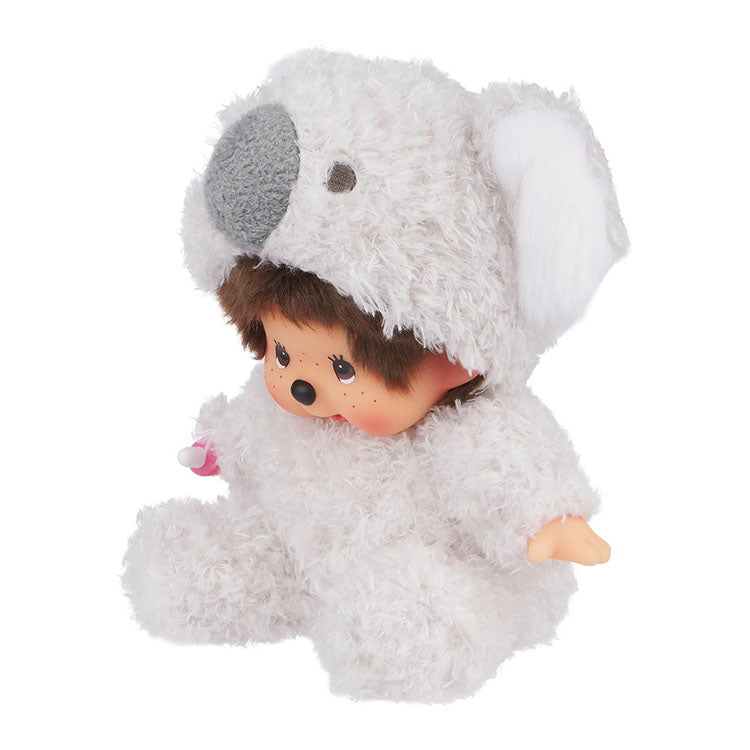 Sekiguchi Monchhichi sitting plush doll dressed in fluffy white koala costume with pacifier accessory.