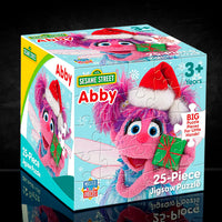 Master Pieces Sesame Street Abby Christmas 25-piece jigsaw puzzle with festive holiday design for ages 3 and up