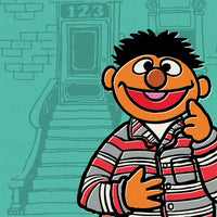 Sesame Street character Ernie wearing red, white, and gray striped pajamas against a teal background with brownstone steps.