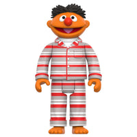 Ernie figure dressed in red, white, and gray striped pajamas standing against a plain white background