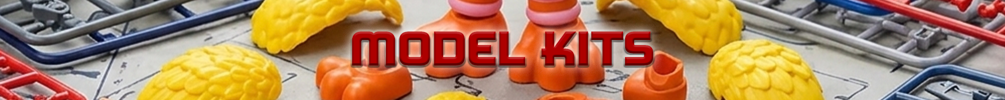 Assembly parts for colorful character model kits arranged on a sprue frame with a focus on toy collectible components