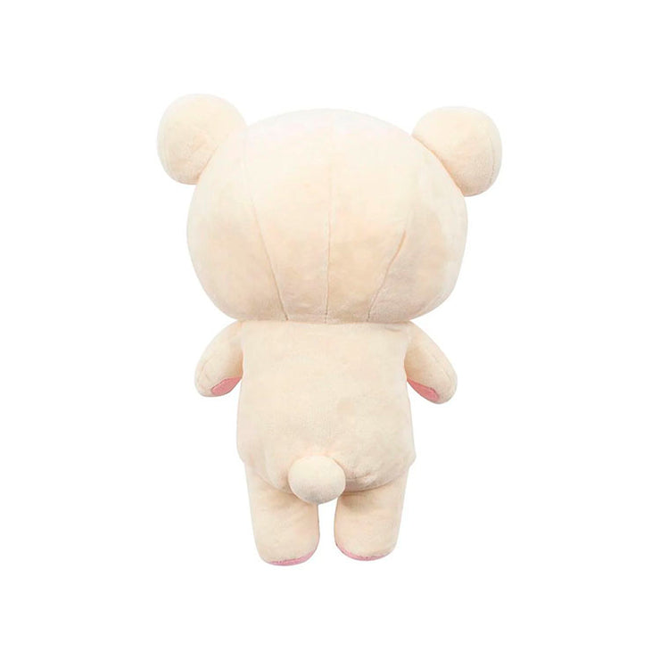 Back view of San-X Korilakkuma 13.5 inch medium plush from Sherbet Series with pink tag and red button detail