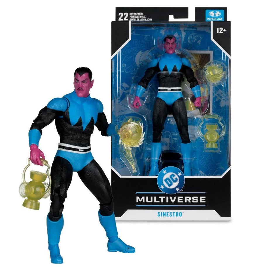 DC Comics Multiverse Sinestrad action figure shown next to its retail packaging. The figure has pink skin, a black and blue costume, and holds a gold lantern.