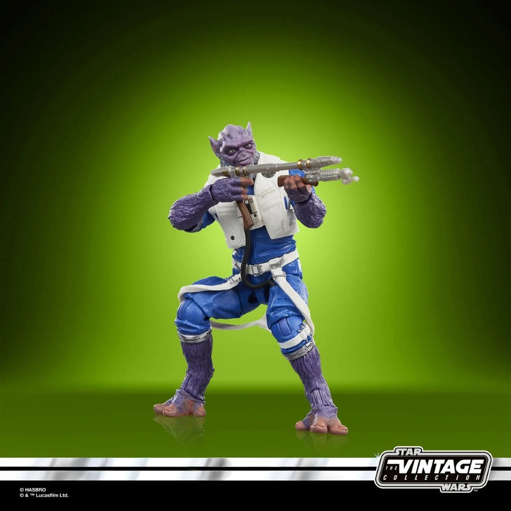Zeb Orrelios Star Wars The Vintage Collection 1:18 scale 3.75" Action Figure by Kenner posed with rifle on green background