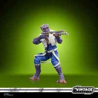 Zeb Orrelios Star Wars The Vintage Collection 1:18 scale 3.75" Action Figure by Kenner posed with rifle on green background