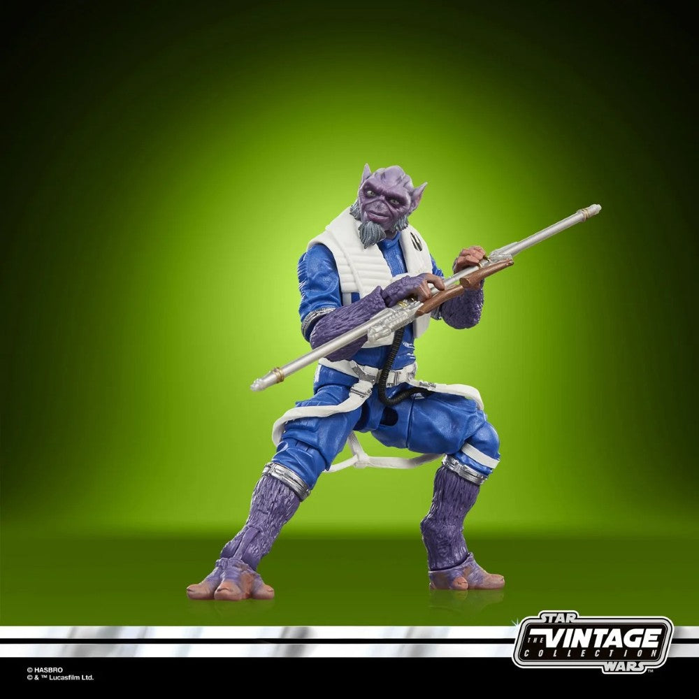 Zeb Orrelios Star Wars The Vintage Collection 1:18 scale 3.75" Action Figure by Kenner posed with staff on green background