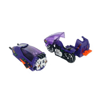 Two purple futuristic toy vehicles with black wheels, translucent canopies, and orange accents against a white background
