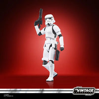 Hasbro Star Wars Vintage Collection Imperial Stormtrooper 3.75 inch action figure posed with blaster on red background