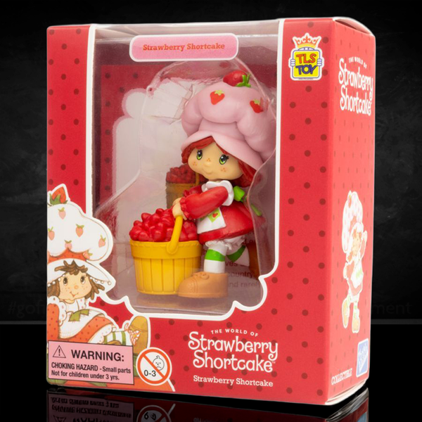Loyal Subjects Strawberry Shortcake 2.5-inch vinyl Cheebee figure in original red packaging with basket of strawberries
