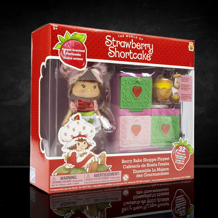 Strawberry Shortcake 5.5-inch fashion doll and Berry Bake Shoppe playset with oven by Loyal Subjects in red packaging