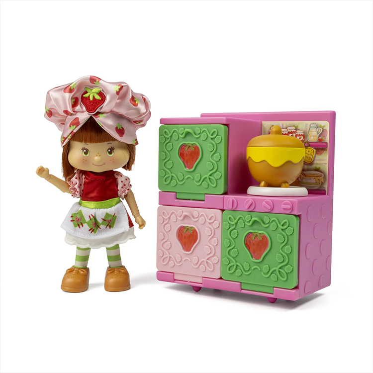 Loyal Subjects Strawberry Shortcake 5.5-inch doll with berry-themed oven playset and accessories for creative play.