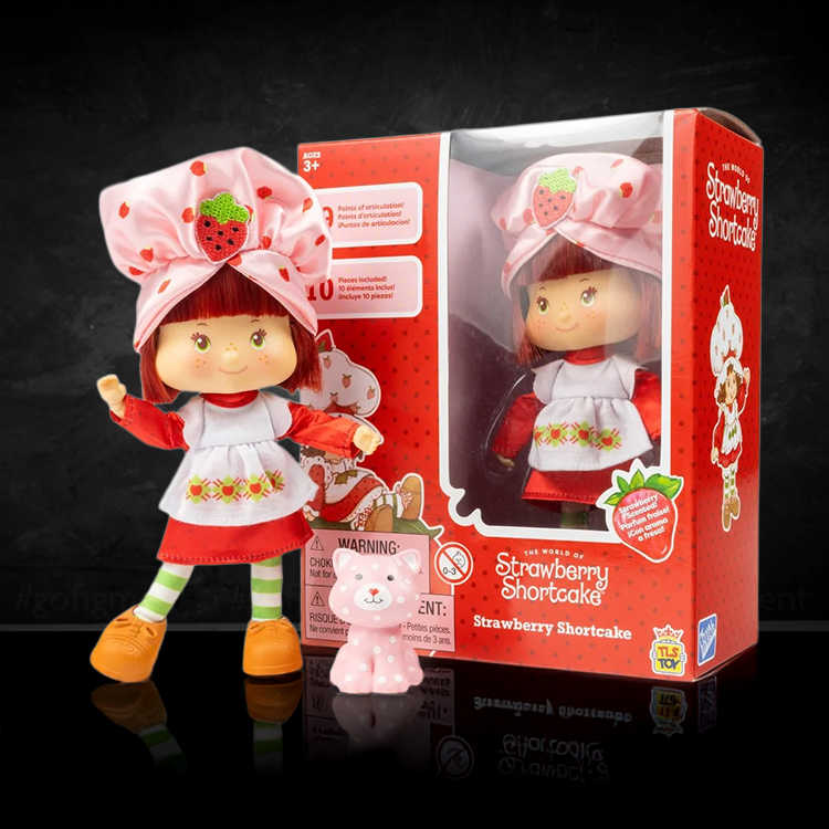 Strawberry Shortcake doll with pink hat, apron, and accessories in red window-style Loyal Subjects packaging