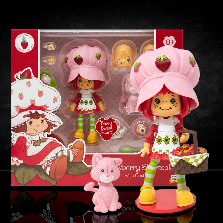 Boss Fight Studio Llc Strawberry Shortcake figure with pink strawberry hat, white dress, green striped stockings, and pink spotted cat accessory