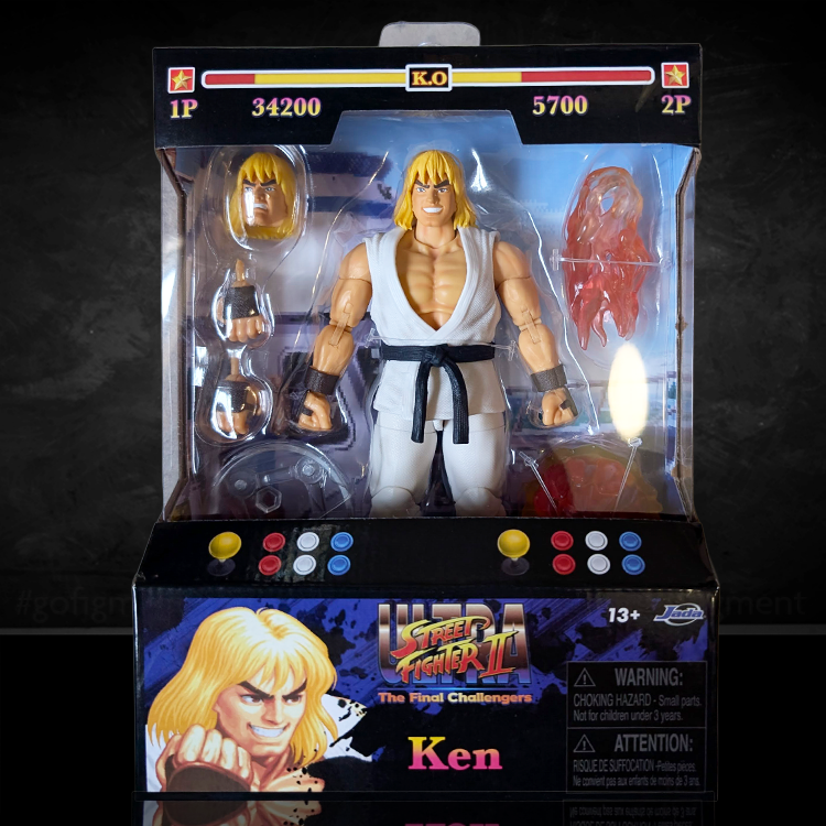 Ultra Street Fighter II Ken Player 2 Version 6-inch action figure in white gi by Jada Toys with accessories and arcade-style packaging