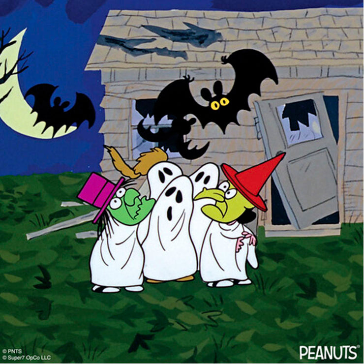 Super7 Peanuts characters dressed as ghosts with multiple eye holes under bats near a spooky house at night