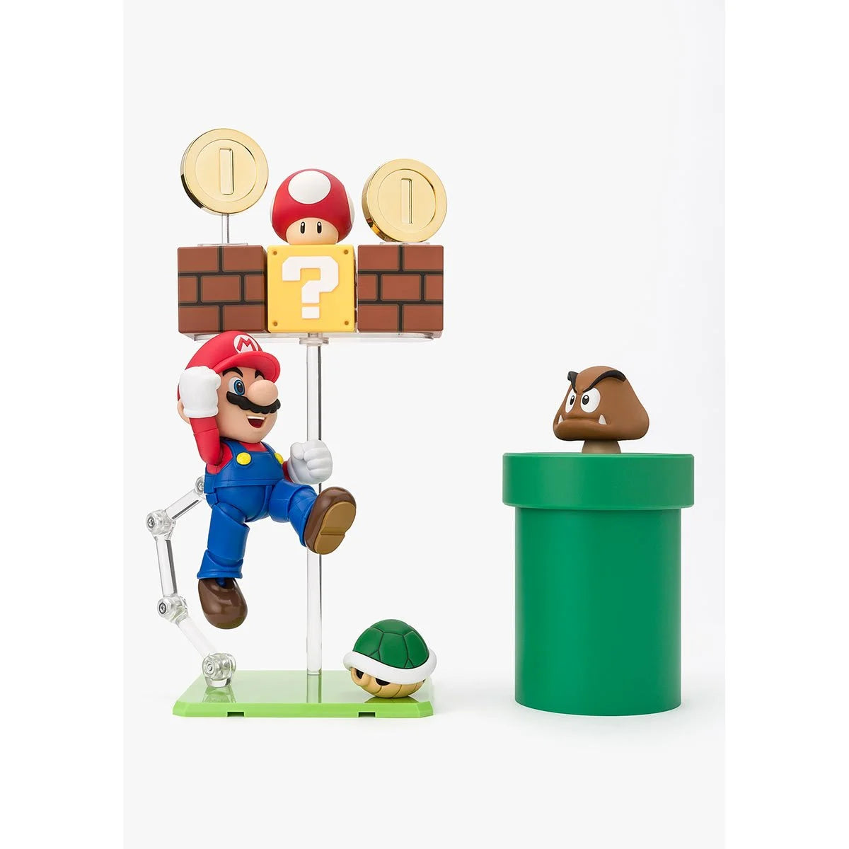 Super Mario Bros S.H.Figuarts Complete 3 Action Figures and Playset by Bandai Tamashii Nations featuring Mario with question block and pipe