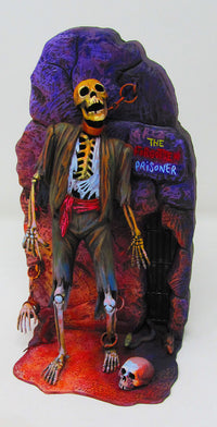 Atlantis Models Forgotten Prisoner of Castel-Mare Glow in the Dark Edition skeleton figure with prison background and shackles