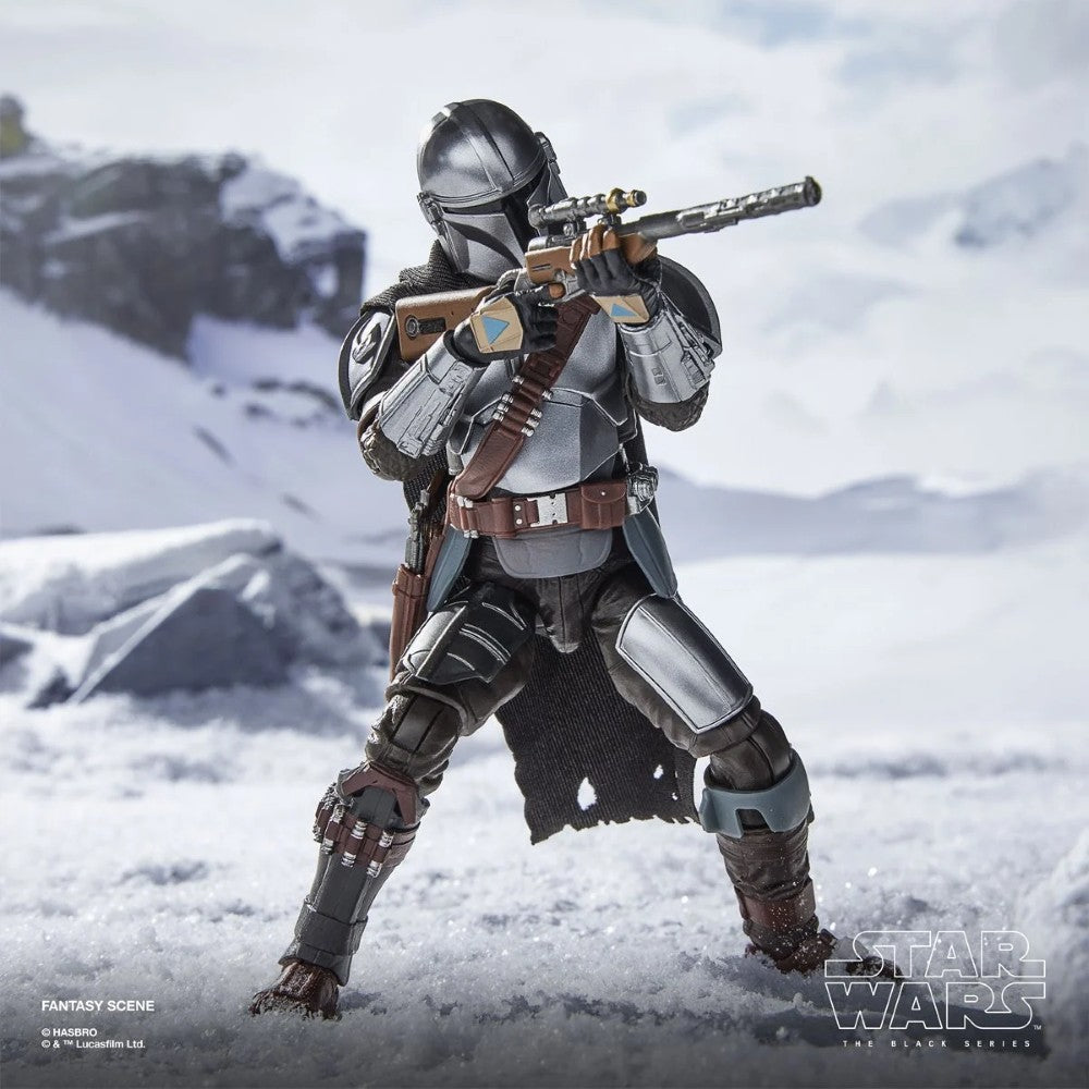 The Mandalorian & Grogu Star Wars The Black Series Deluxe 6-Inch Action Figure Set with Accessories by Hasbro posed in snowy terrain