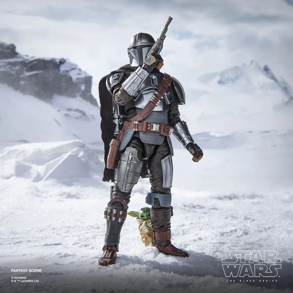 The Mandalorian & Grogu Star Wars The Black Series Deluxe 6-Inch Action Figure Set with Accessories by Hasbro in a snowy scene