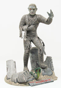 Atlantis Glow in the Dark Mummy Model Kit 1/8 Scale Aurora Tooling USA Made featuring a detailed mummy figure and tomb props