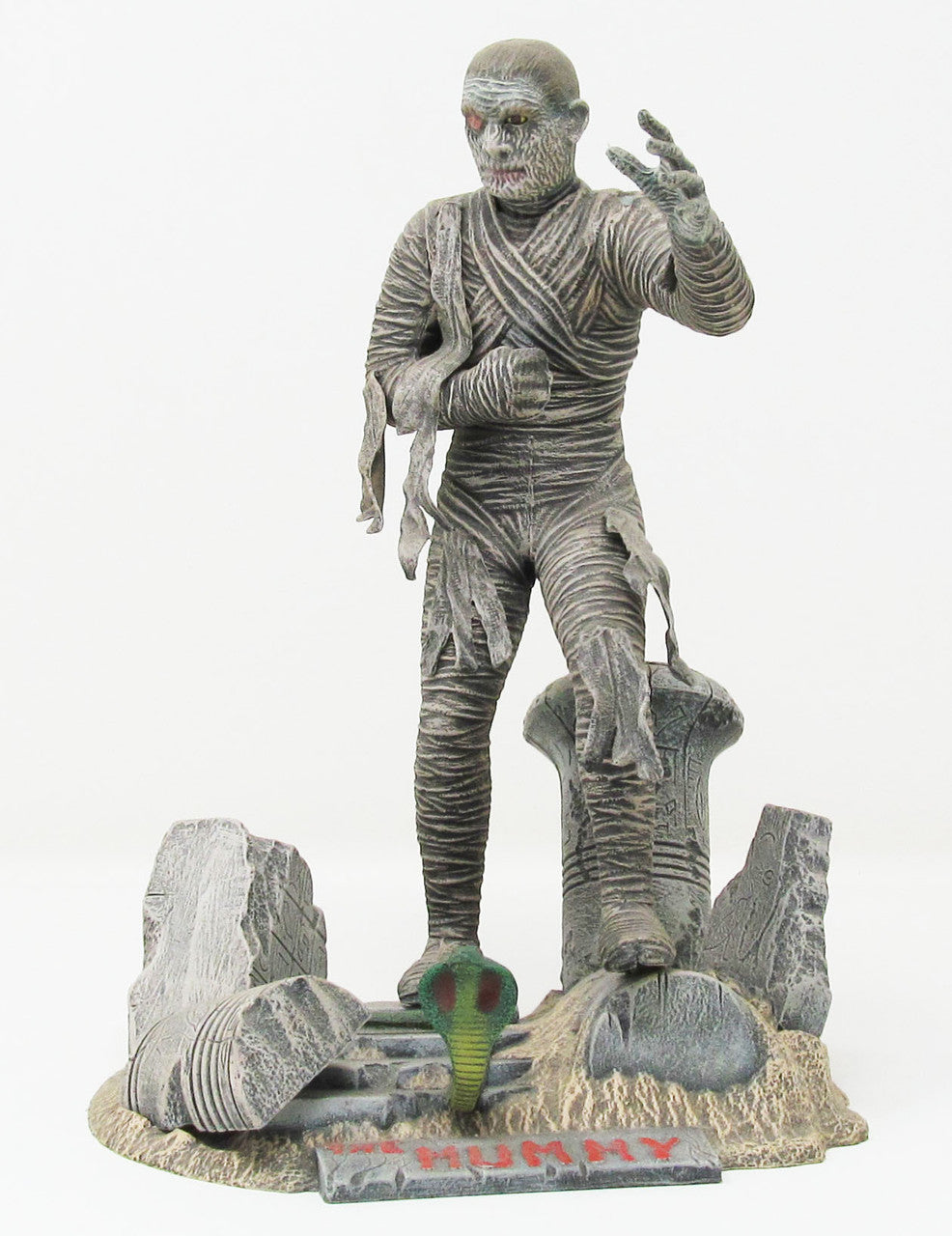 Atlantis Glow in the Dark Mummy Model Kit 1/8 Scale Aurora Tooling USA Made by Atlantis Models with detailed mummy figure and base.