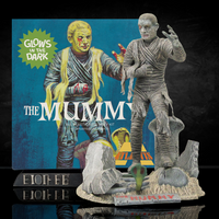 Atlantis Glow in the Dark Mummy Model Kit 1/8 Scale Aurora Tooling USA Made with detailed eerie mummy figure and display base.
