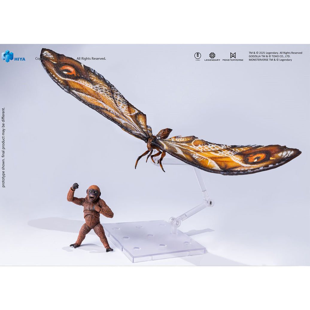 Large winged insect figure with detailed orange and brown patterned wings displayed on clear stand beside small articulated ape figure