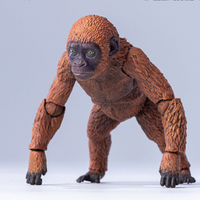 Articulated ape figure with textured orange-brown fur and detailed facial features posed on smooth pale surface