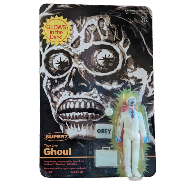 Packaged Super7 They Live Ghoul action figure with accessories and glow in the dark card art