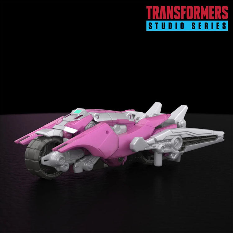 Hasbro Transformers Studio Series Deluxe Elita-1 figure in Cybertronian trike mode with detailed sculpt and pink design