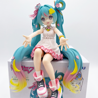 Hatsune Miku 10th Anniversary Noodle Stopper Statue FuRyu by Furyo with pastel hair and floral dress sitting pose