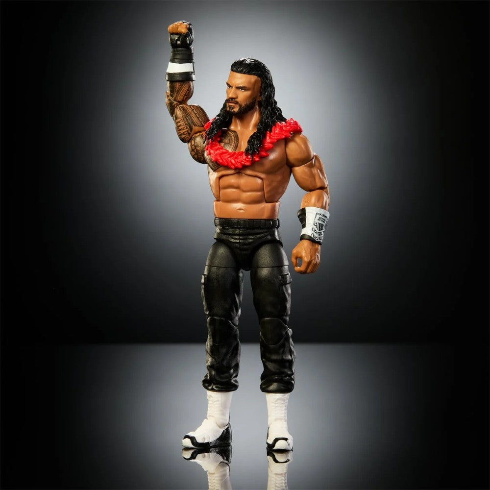 Muscular action figure with long dark hair, beard, red lei, black pants, and white boots