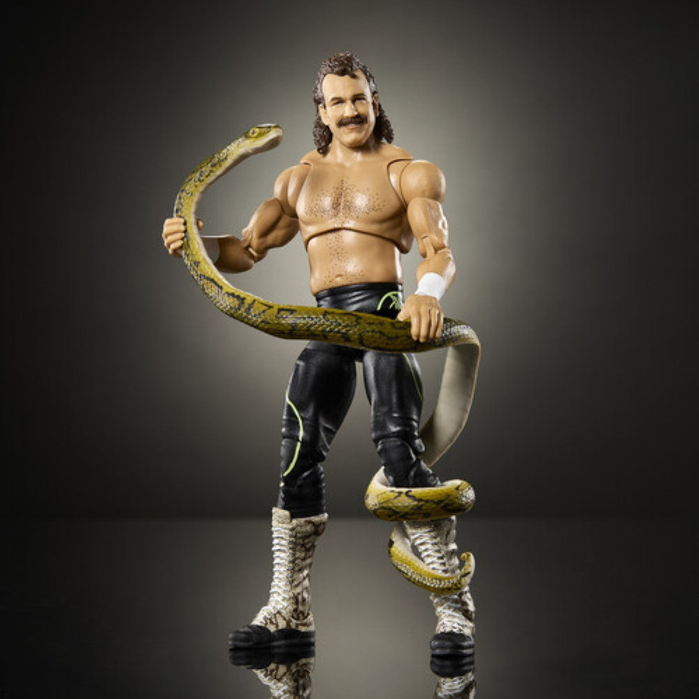 Mustached wrestling figure holding a snake, wearing black pants and white lace-up boots on a dark background