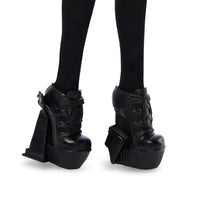 Monster High Wednesday Addams Fashion Doll - Season 2 Edition by Mattel, showing black platform boots